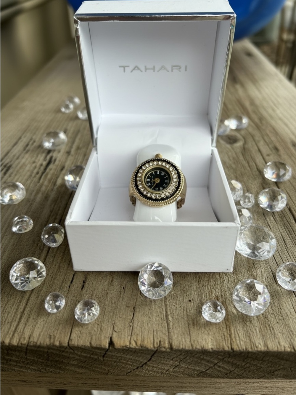 Tahari Gold Tone Ring Watch with Black Dial and Crystal Accent Bezel 
NWT